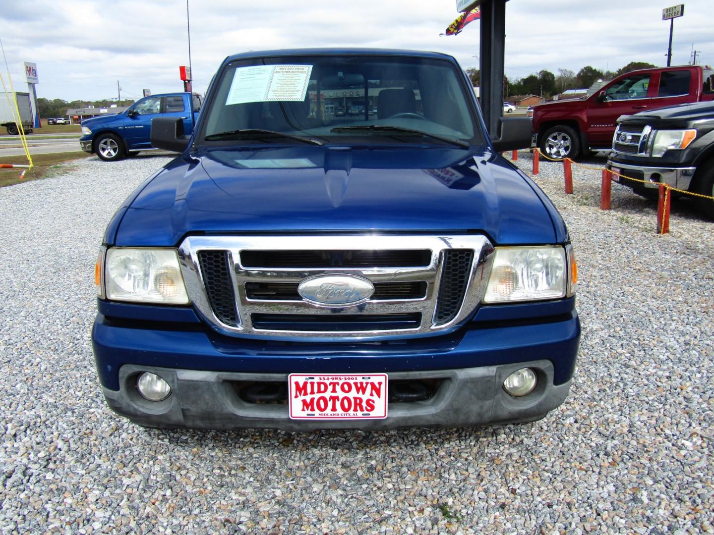 2010 Blue /Black Ford Ranger Sport SuperCab 4-Door 4WD (1FTLR4FE6AP) with an 4.0L V6 SOHC 12V engine, Automatic transmission, located at 15016 S Hwy 231, Midland City, AL, 36350, (334) 983-3001, 31.306210, -85.495277 - Photo#1